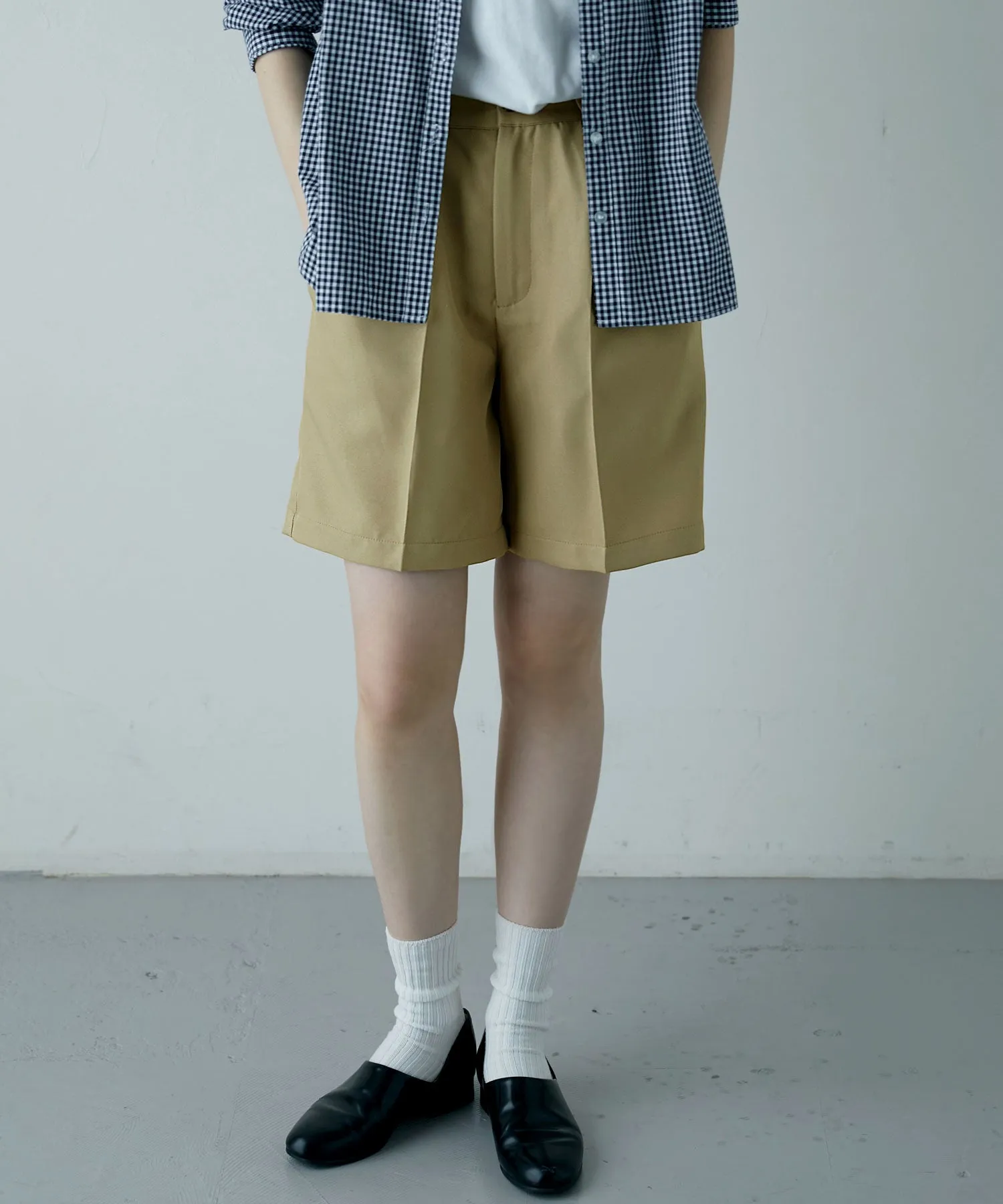 Center press tack shorts